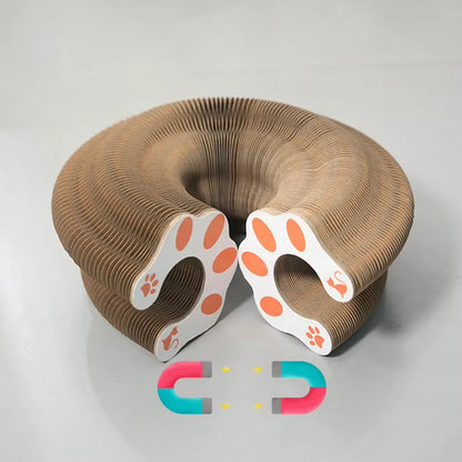 A close-up view of the Pawsome-Flex™ Magic Accordion Scratcher and Toy highlighting the powerful magnetic connectors and the decorative cat paw pattern on the connecting ends.